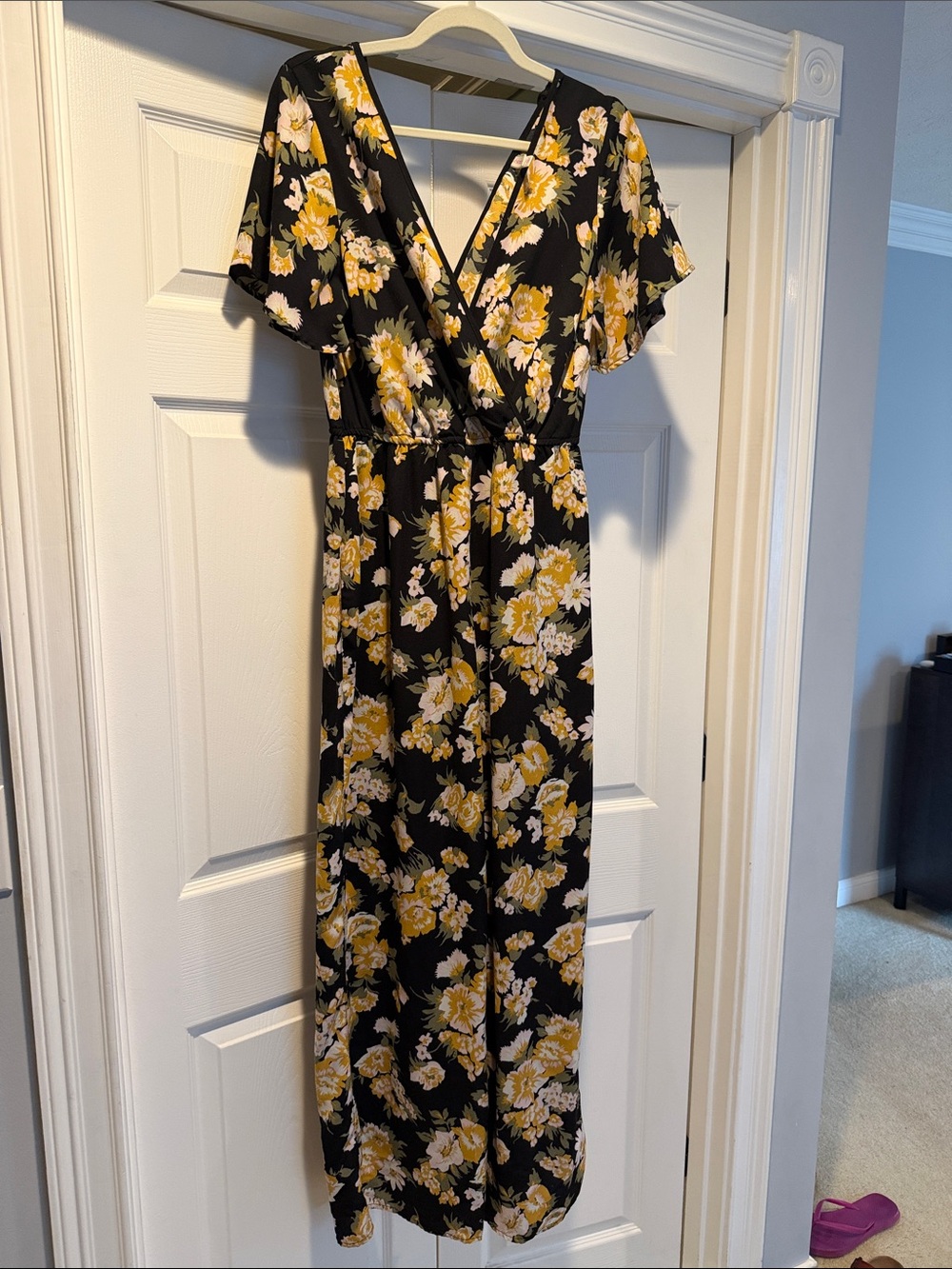 Black Elegant Jumpsuit with Yellow Floral Print and V-Neck